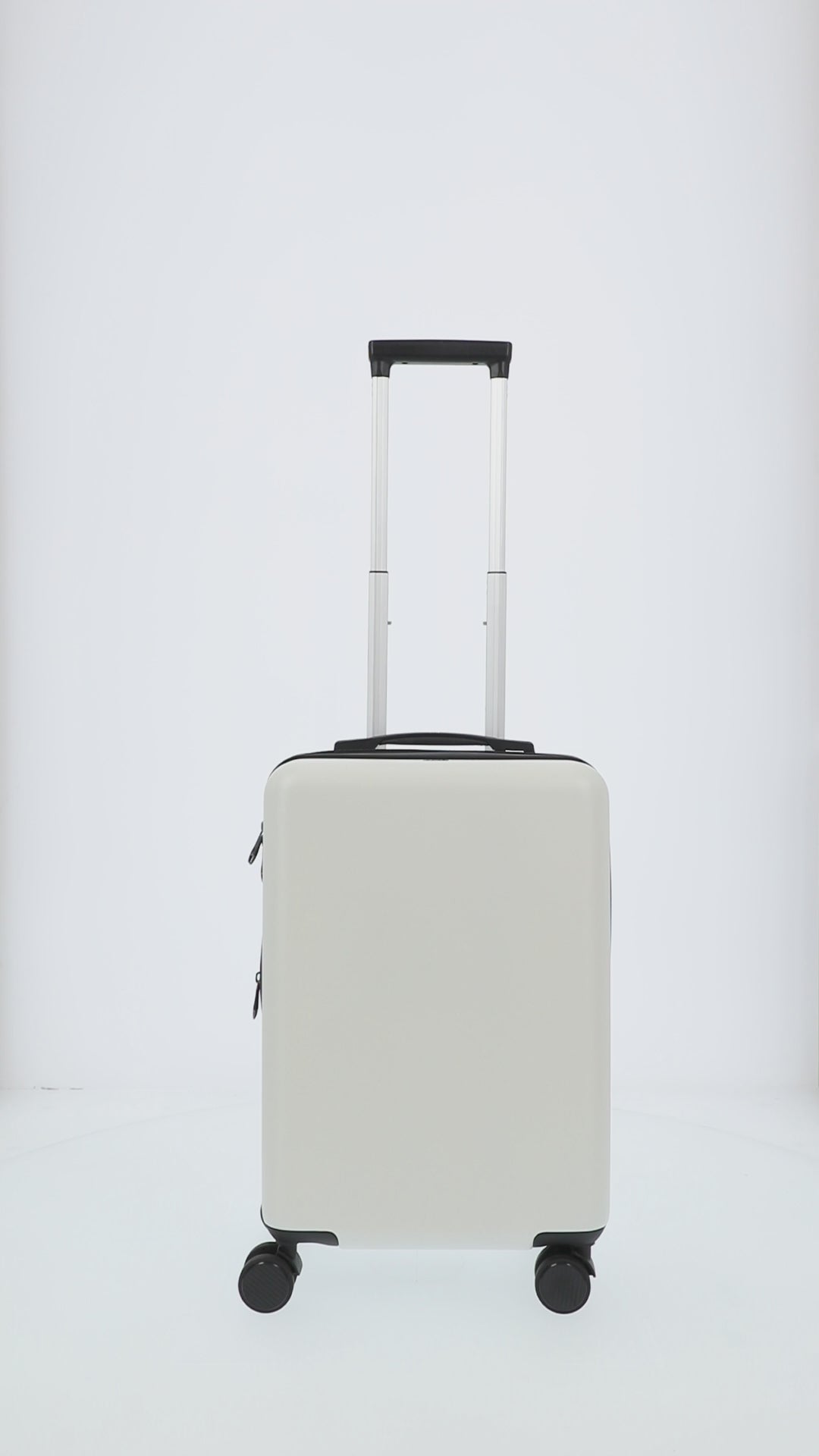 White 22.5" carry-on spinner suitcase luggage by Ful