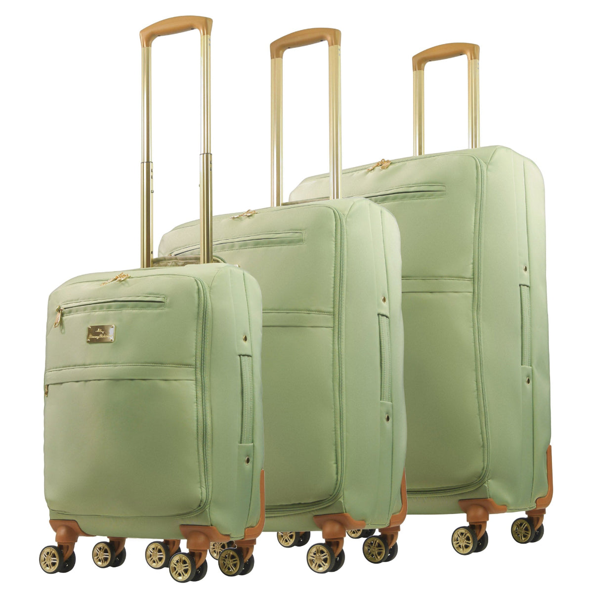 Green 3-piece soft-sided spinner luggage suitcase set durable, and easy maneuverability with 360° spinner wheels and gold handle. Officially licensed Tommy Bahama. Angled.