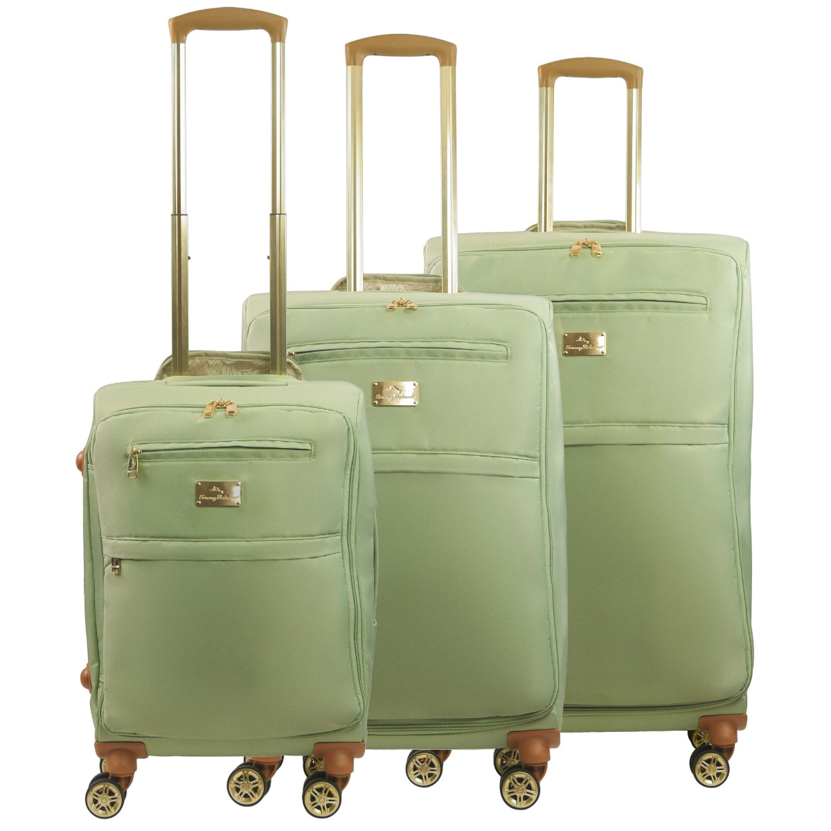 Green 3-piece soft-sided spinner luggage suitcase set durable, and easy maneuverability with 360° spinner wheels and gold handle. Officially licensed Tommy Bahama. Front view.