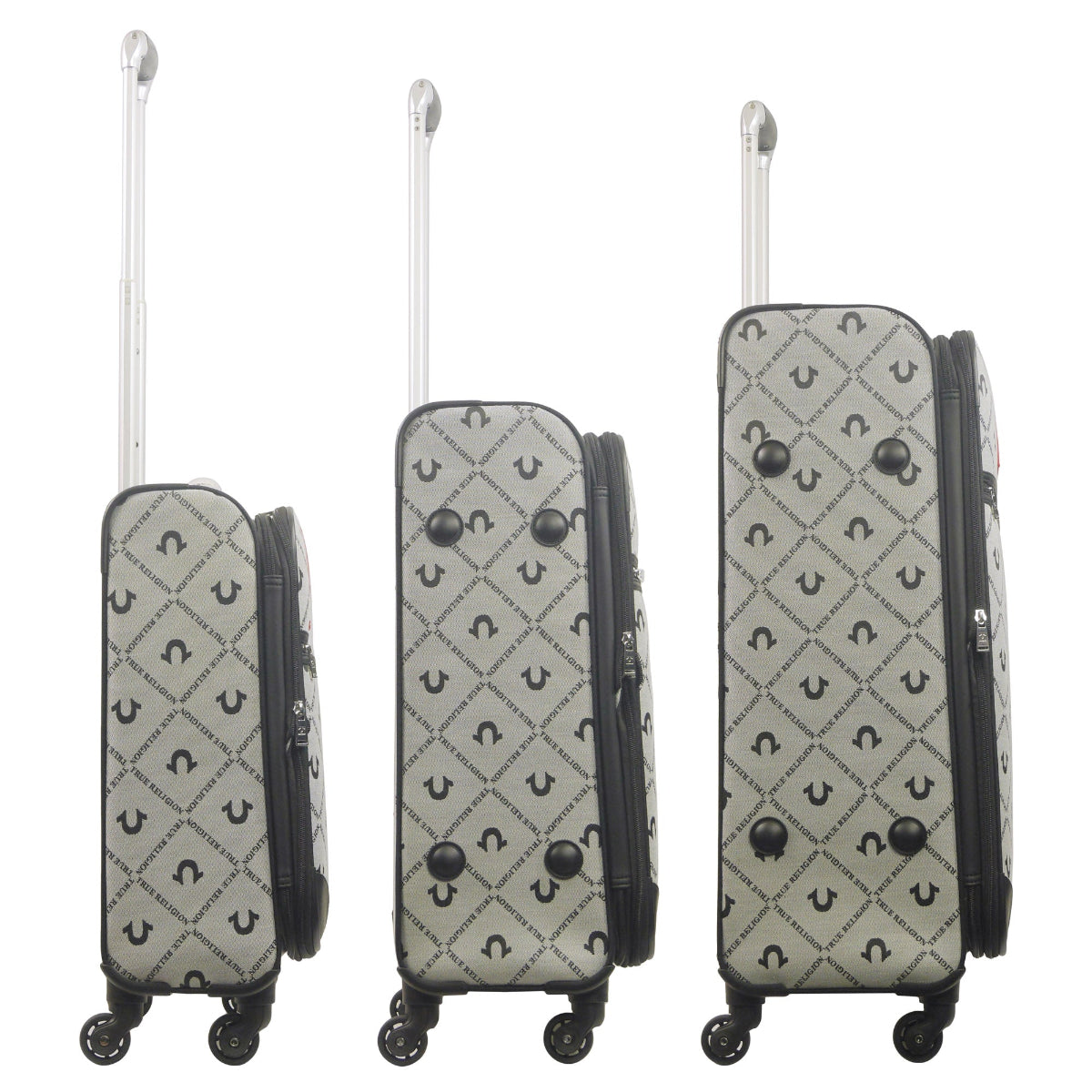 True Religion 3-piece black soft-sided expandable suitcase spinner luggage set features iconic logos in a monogram and the signature Buddha patch. Side view.