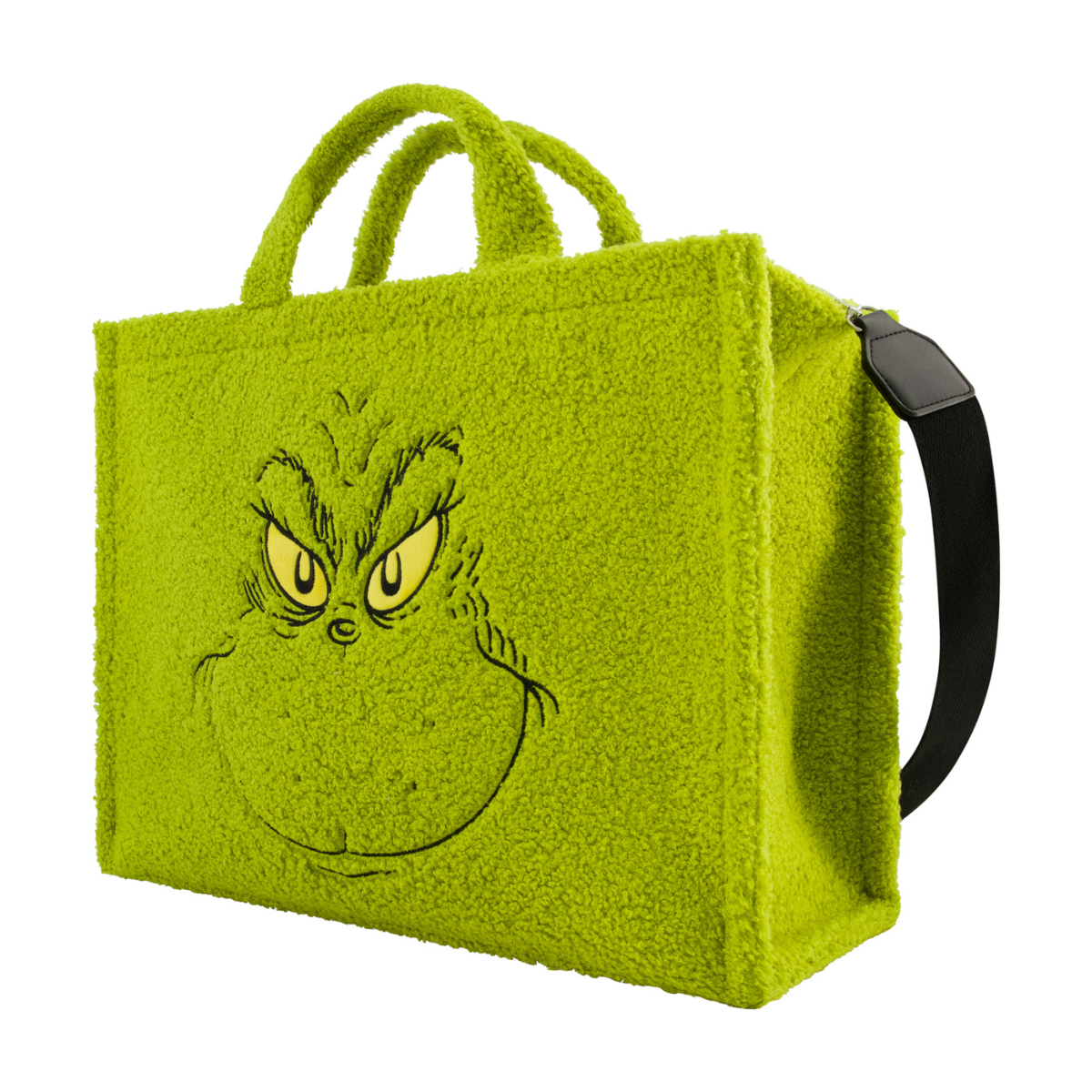 Right angle of Dr. Seuss green Grinch big face sherpa travel tote with trolly band and adjustable removable shoulder strap.